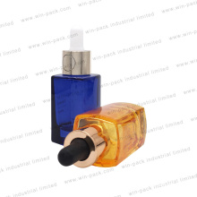 Hot Sale 30ml Glass Dropper Transparent Orange Color Glass Shiny Collar Bottle with Flat Shoulder